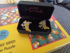 The Simpsons double sided Jigsaw and Homer Cupid Cufflinks