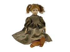 Artist doll wax on porcelain