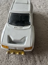 Corgi die-cast model Of A Peugeot 205 Turbo 16 rally car.