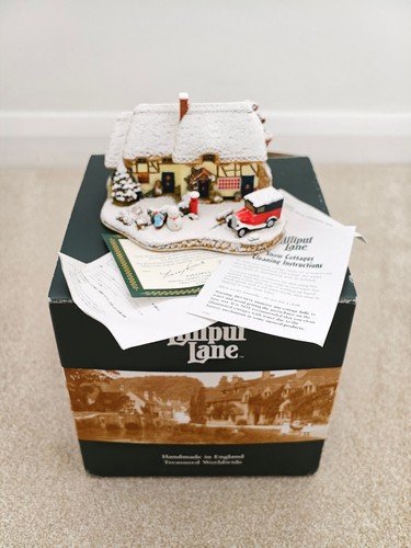 Lilliput lane decorating the - decorating,
