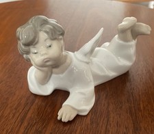 Lladro Reclining Angel Laying