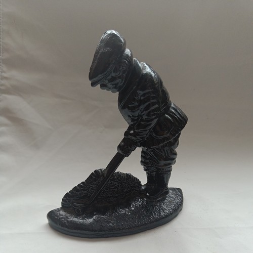 Cast iron golfer - golfer, statue