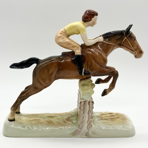 Beswick girl jumping horse - girl, on