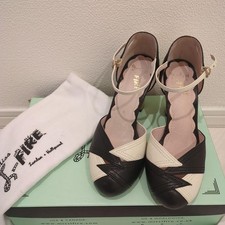 Miss L-Fire Strapped High