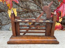 Antique wooden pipe stand, 30 cm long x 24 cm high.