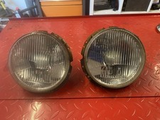 Pair of Genuine 7” Glass  Hella RHD Headlights from Classic VW Beetle & Brackets