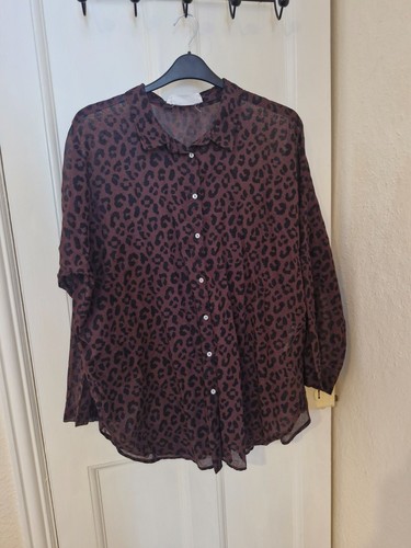 Leopard print beach cover - up,