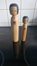 A Pair of Vintage Kokeshi Doll