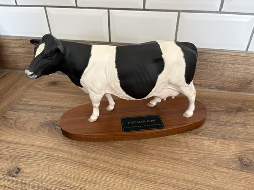 Beswick fresian cow and - fresian, calf