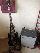 4 string bass guitar used And Fender Rumble 100 Watt Amp