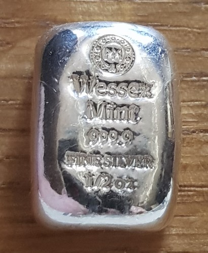 2oz poured silver - 1/2oz,