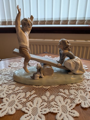 Lladro figurine boy and girl - lladro,