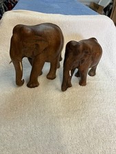 Two Carved Graduated Elephants , large  18cm and medium 15cm height size