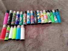 Bulk of 22 various design clippers, stranger things, cannabis and more designs