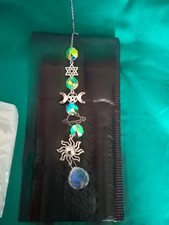 small metal and plastic sun catcher