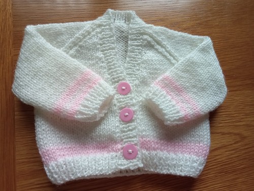 Hand knitted baby girls