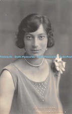 R408474 A woman with short hair and a necklace Wanstead and Epping 1926