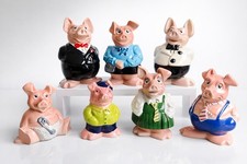 7 Vintage Pottery Pig