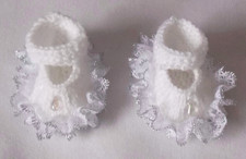 Hand knitted dolls clothes