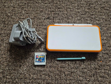 Nintendo 2DS XL Orange & White Handheld System + Charger + 1 Game