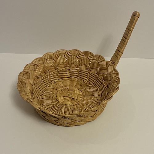 Round beige wicker basket with - round,