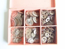 Large vintage lot of 100s pocket watch crown and ratchet wheels, boxed parts