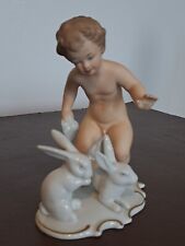 WALLENDORF PORCELAIN FIGURE OF A YOUNG BOY WITH 2 RABBITS. 
