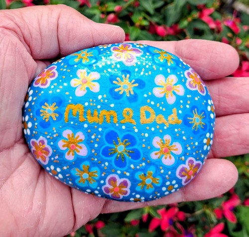 Hand painted pebble rock - hand,