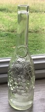 Vintage A M Grape Vine Design Pressed Light Green Tinted Glass Bottle 12” Tall 