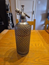 Vintage Sparklets Soda Siphon - Glass Bottle With Wire Mesh.  