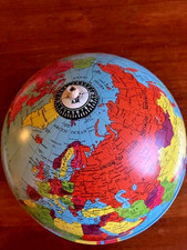 vintage globe in aliminium