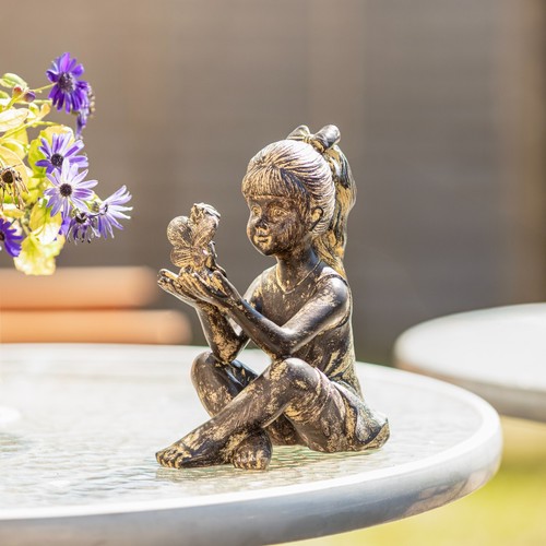 Girl garden ornament sitting - girl,