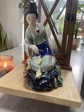 porcelain Geisha lady  with