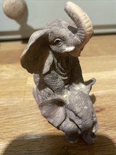 2 small Elephant Figurines