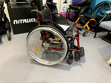 Quickie Life R red frame with push handes and composite side guards