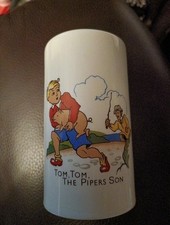 Vintage Money Box. Picture and description Tom Tom The Pipers Son. With stopper.