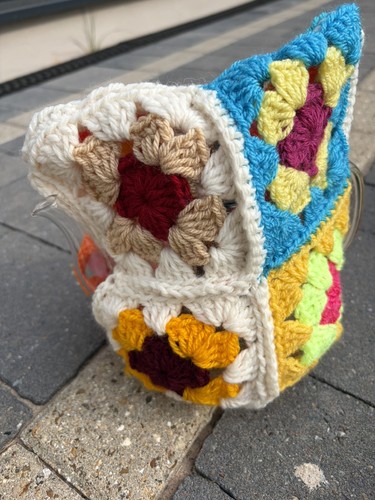 Crochet knitted tea cosy