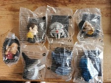 A Collection Of 7 Unopened