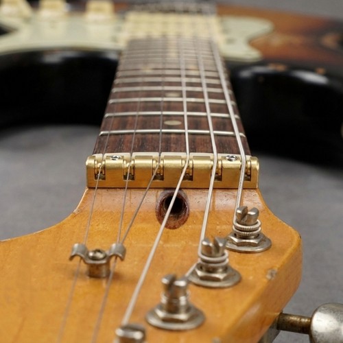 Brass guitar nut improves - brass,