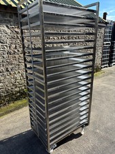 20 Shelf stainless steel trolley and 40 x perforated aluminium tray 762m x 457mm