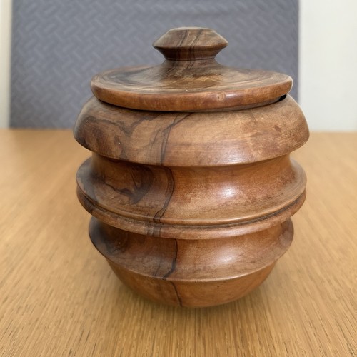 Hand turned wooden pot lid - hand,