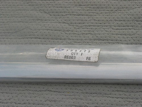 Nos front wing moulding - front, l/h