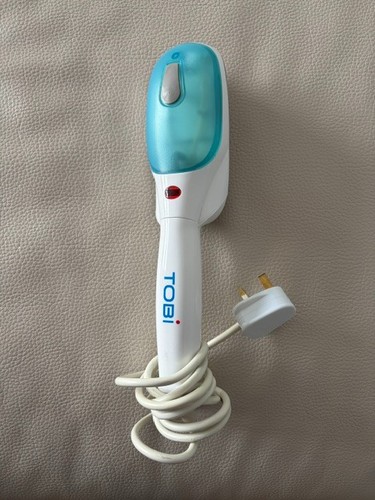 Tobi handheld garment - handheld,