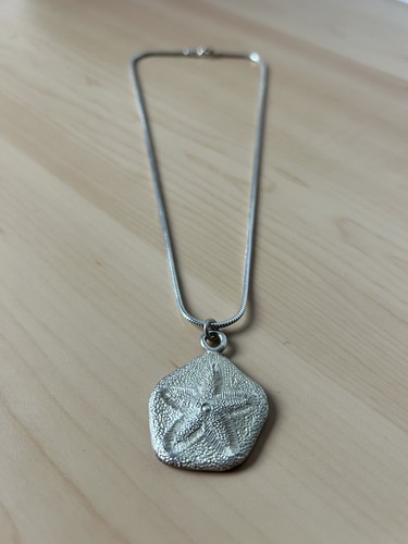 Sand dollar pendant textured