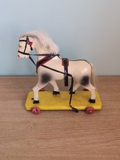 Painted wooden horse pull along toy, circa 1950s, made in GDR