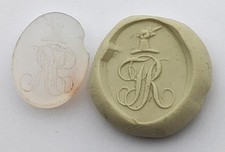 GEORGIAN ARM HOLDING SWORD