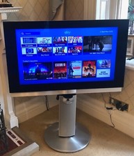 B and O Beovision 7- 40" TV, with motorised stand, speaker and DVD, in use.