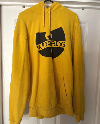 Tang yellow black logo - &,
