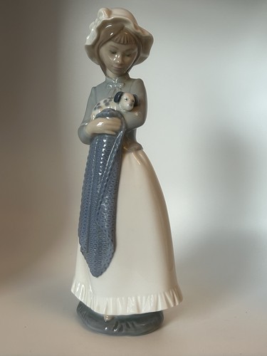 Lladro nao girl holding a - nao,