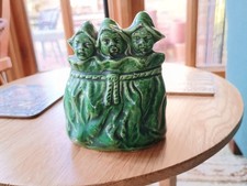 RARE ANTIQUE GREEN GLAZE POTTERY COIN BANK MONEY BOX 3 CHILDREN IN SACK 1887